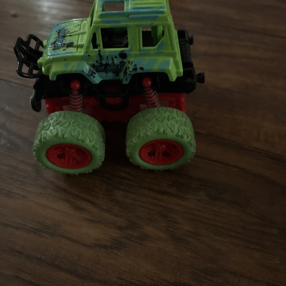 HOT WHEELS MONSTER TRUCKS 1:64 DIECAST GLOW In The Dark Neon Gunkster Dino